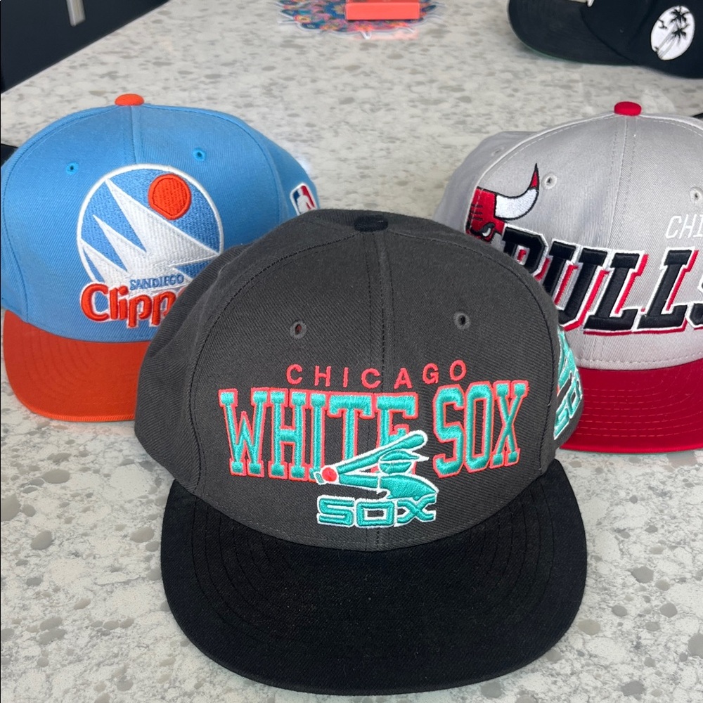 Snap back caps. Can separate and sell individually